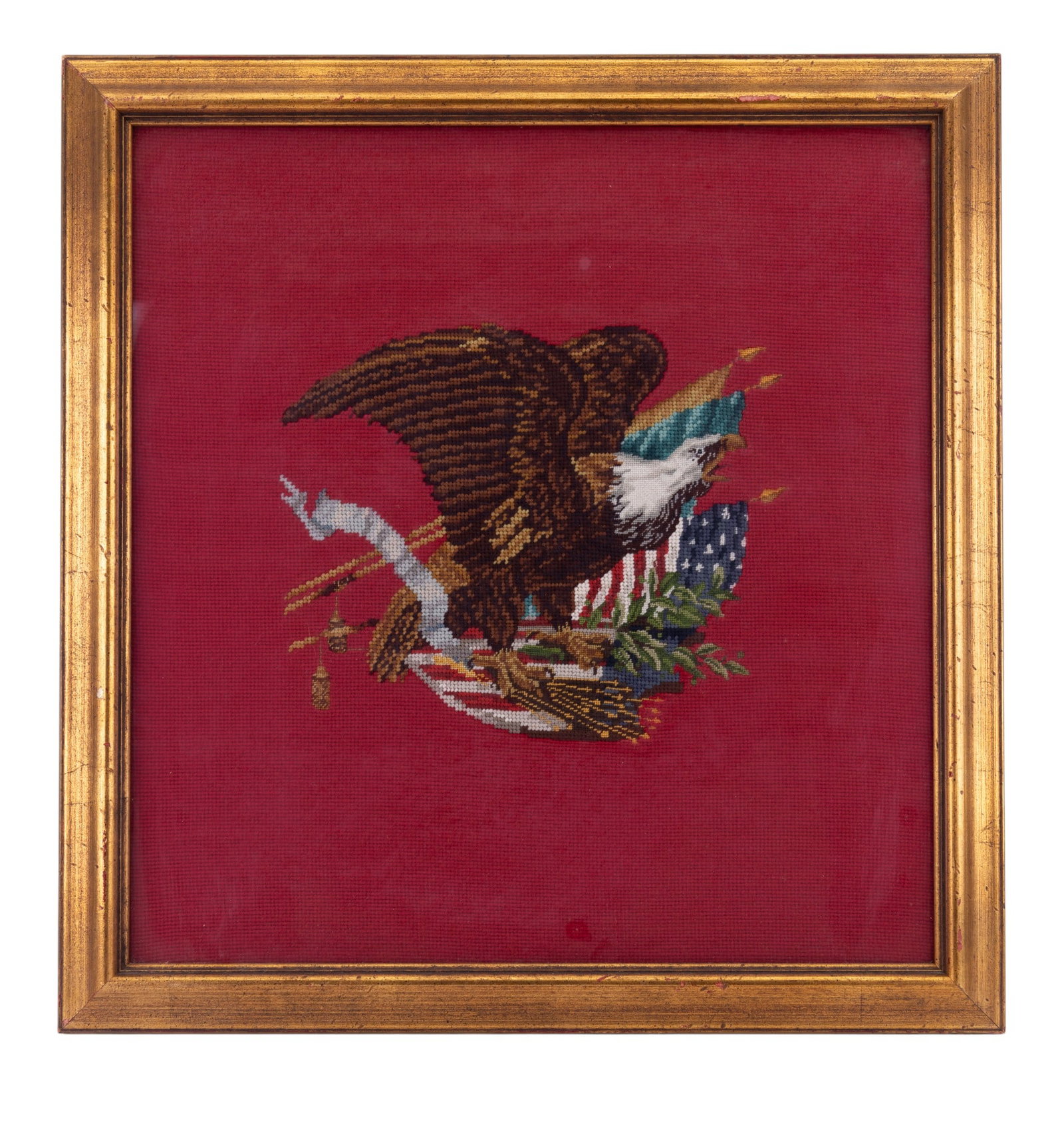 Vintage U.S. Needlepoint Eagle Embroidery: Vintage framed needlepoint embroidery of an American eagle w/ the U.S. flag, olive branch, & arrows. Frame measures approx. 25" x 24".