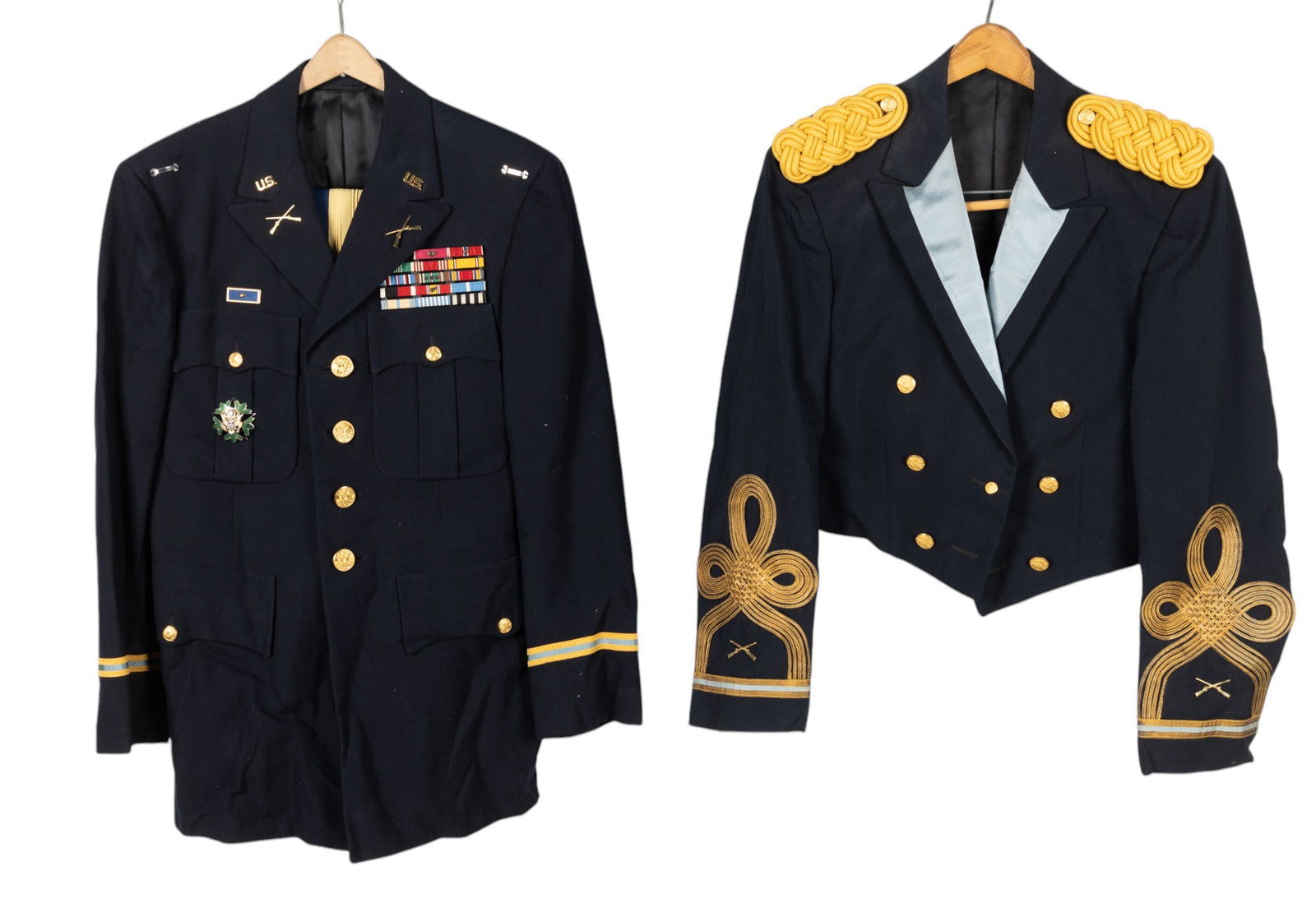 US Army Officers Dress Jackets: Army Rifleman officers dress uniform made by Lautersteins San Antonio with DOD Staff officer brooch, 17" shoulder and 30" waist for the pants and Riflemans mess dress uniform jacket, 17" shoulder.