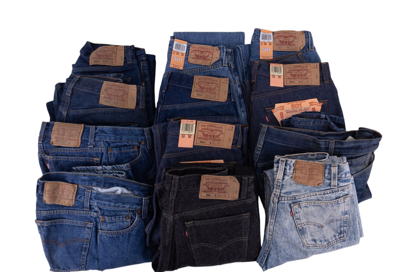 Vintage Levi Strauss 501 Jeans (10): Ten pairs of vintage Levi Strauss 501 denim jeans made circa 1980s-90s, all 32x30, two pairs new with tags, one black pair, one acid wash with a button fly, two pairs light blue 30x30 new with tags, a