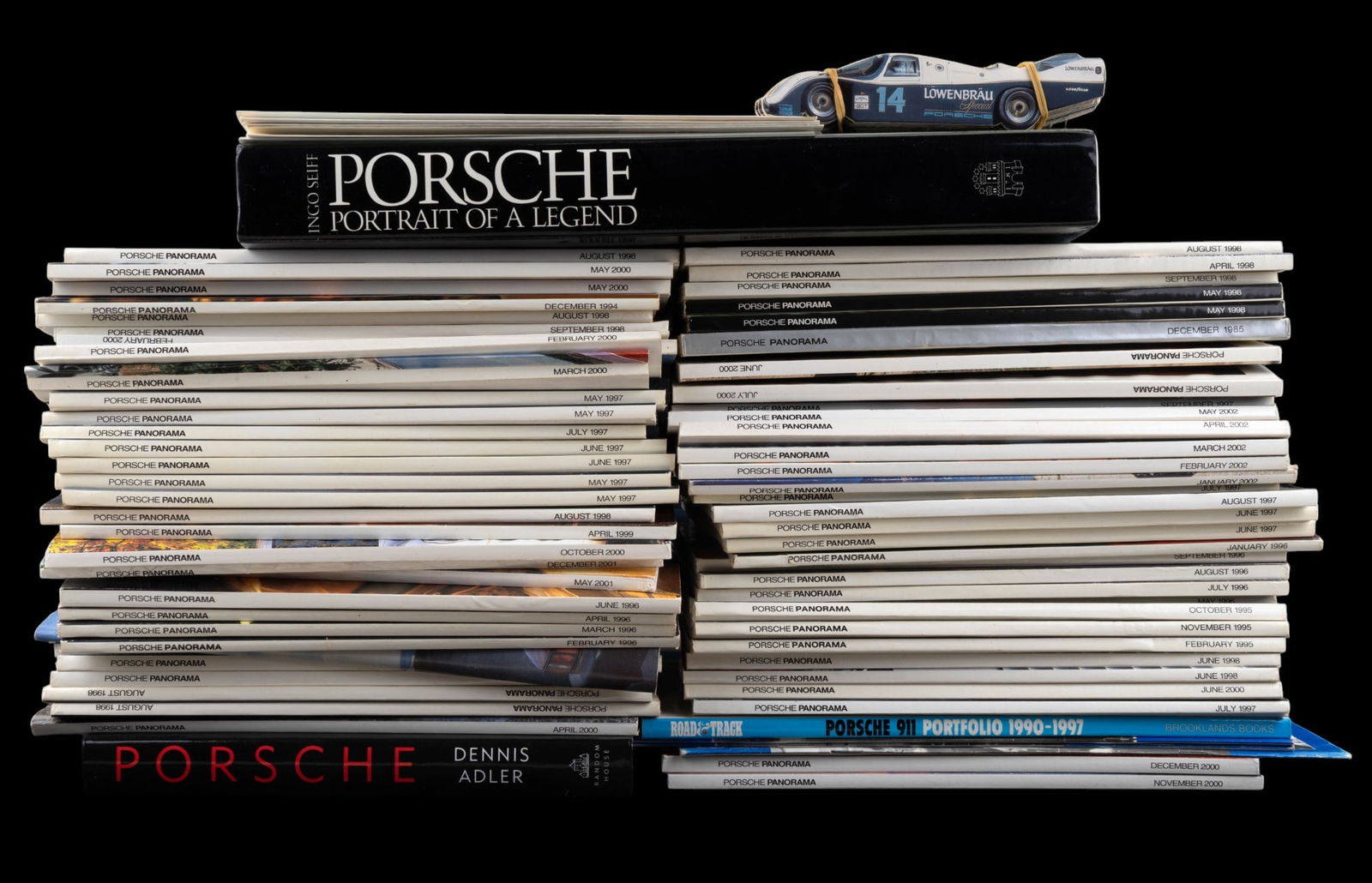 Porsche Coffee Table Book and Magazines: Porsche: Portrait of a Legend large coffee table book with photos by Ingo Seiff and written and compiled by Hoffman und Campe, Porsche: The Road from Zuffenhausen by Dennis Adler, a large collection o