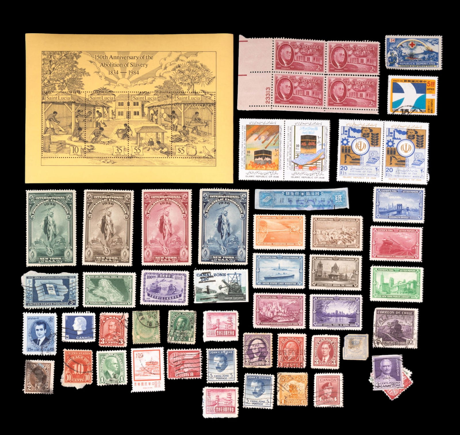 USA & International Stamp Collection: Variety of 55 total stamps from the United States, China, Canada, Iran, Saint Lucia & Chile. Some are circulated and some are not. Grouping includes a set of stamps for the Saint Lucia 150th Anniversa