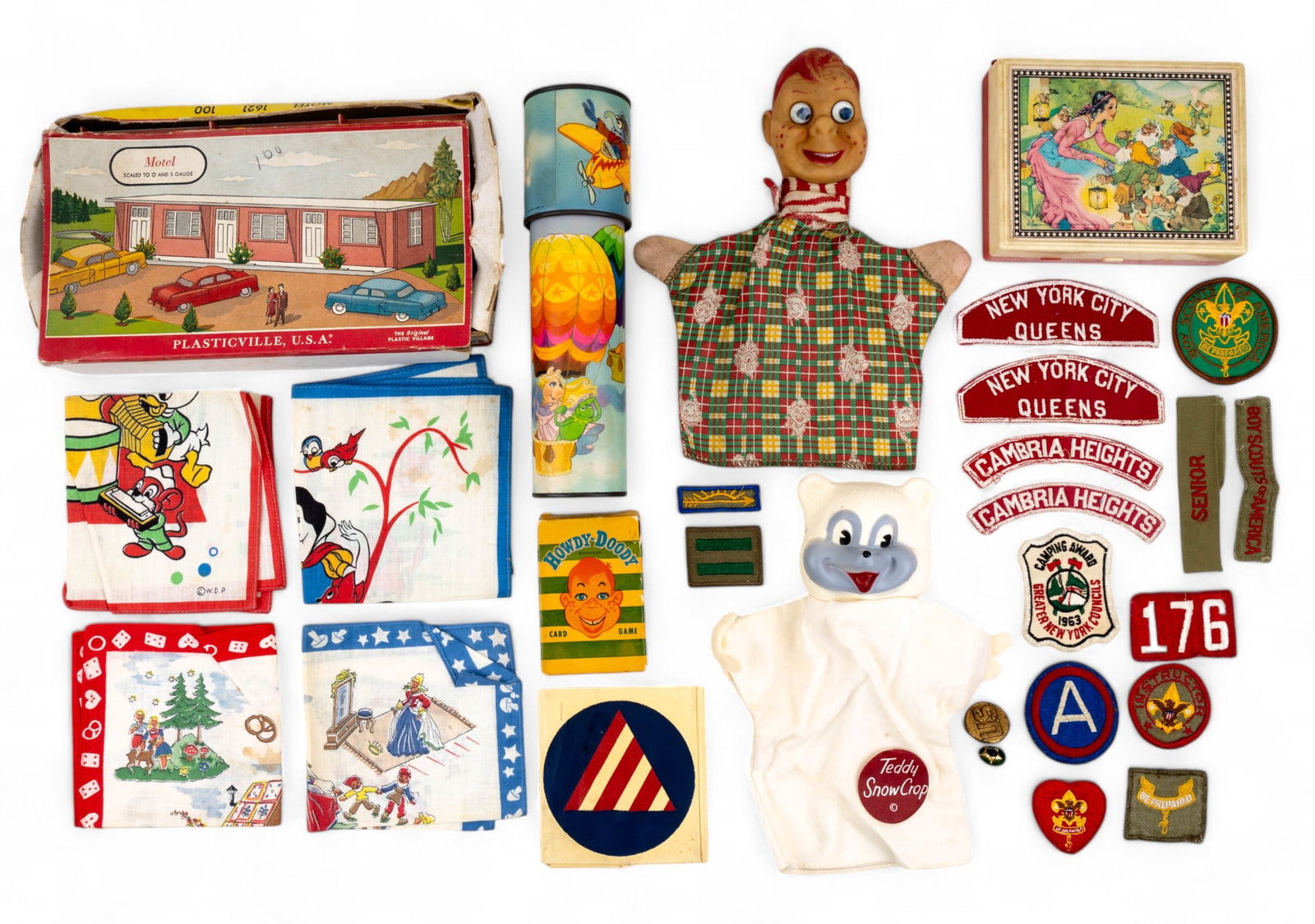 Vintage Howdy-Doody and Other Toys: Collection highlights a Howdy-Doody hand puppet and playing cards, Teddy Snow Crop hand puppet, Muppets kaleidoscope, block puzzle with case, 4 Disney and Grimm handkerchiefs, assorted Boy Scouts patc