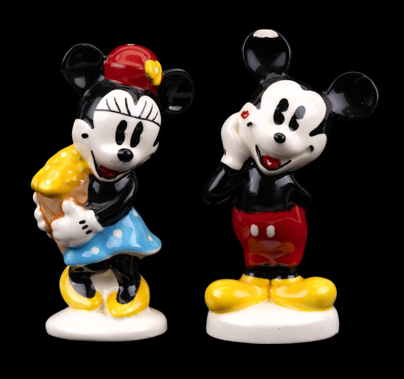 Minnie & Mickey Mouse S&P Shakers: Vintage Treasure Craft / Disney Minnie and Mickey Mouse salt and pepper shakers measuring approx. 5" H - Mickey has some loss on ear and tongue.