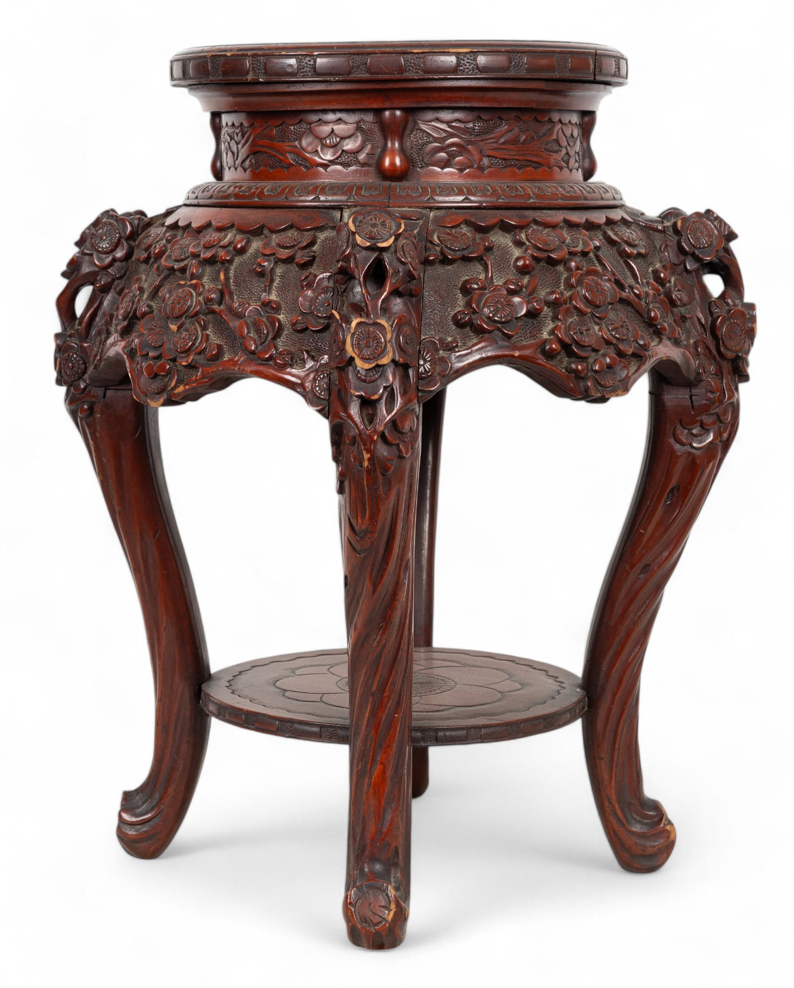 Chinese Carved Rosewood Plant Stand / Side Table: Early Chinese carved rosewood plant stand / side table w/ intricate raised floral design. Some minor wear around piece. Screws need to be tightened, as there is some instability. Stand measures approx