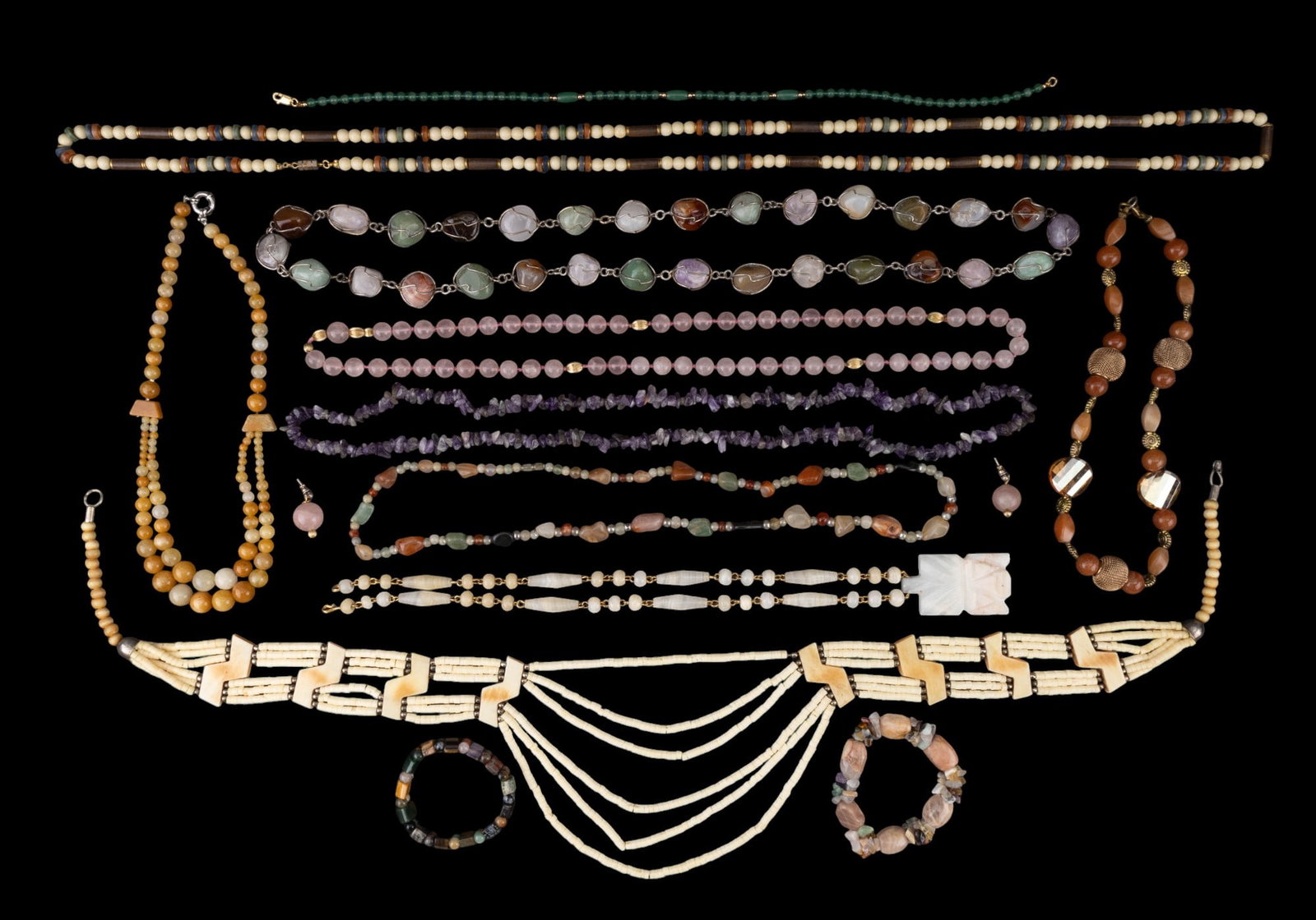 Hardstone Bead & Chunk + Bone Bead Jewelry: Hardstone bead & chunk necklaces of various pastel colors, including a carved Aztec emperor marble pendant & bead necklace, multi-stone necklaces & bracelets, & more. There is also a bone / natural ma