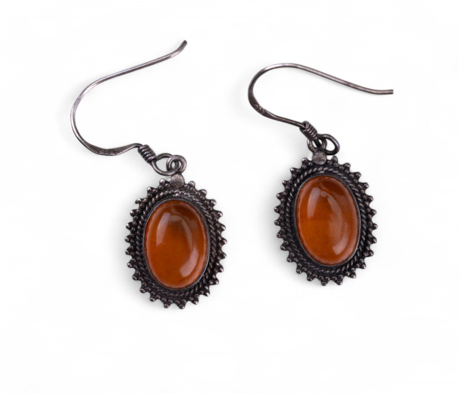 Baltic Amber Sterling Earrings: Baltic amber sterling silver detailed cabachin earrings.