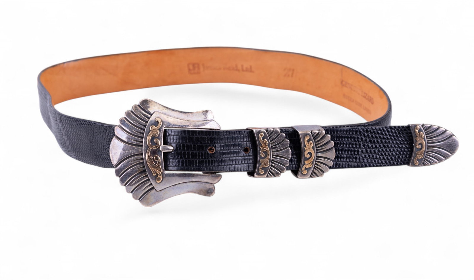 James Reid Santa Fe 14K BDP Sterling Lizard Belt: JR (James Reid) Ltd. Santa Fe 14K BDP .925 sterling silver & genuine lizard steer hide lined belt. Sterling silver belt buckle pieces have 14K gold acanthus leaves accents. Belt is approx. 35" long.