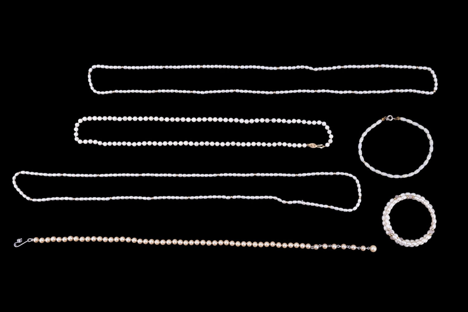 Pearl Necklace w/ 14K Gold Clasp & More Necklaces: Pearl necklace approx. 26" long w/ 14K gold clasp, 2 freshwater pearl necklaces w/ gold tone beads, freshwater pearl coil bracelet, faux freshwater pearl bead bracelet, & faux pearl choker necklace.