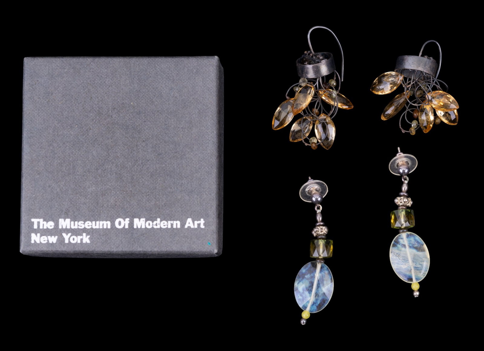 Citrine and Moonstone Drop Earrings: Unusual metal loop and cut citrine drop earrings and a pair of MoMA pierced dangle earrings with oval cut moonstone and green cut crystal bead, no marks.
