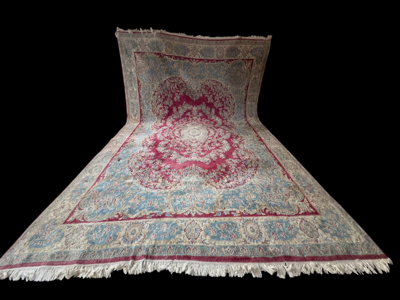Large Persian Rug, Almost 10' x 15': Woven Persian carpet approx. 14'11" x 9'9" w/ livid blue-gray, cerise reddish pink, dull pink, mint green, sage green, tan, & ivory patterns w/ floral motifs. (Internal KA note old # 224)
