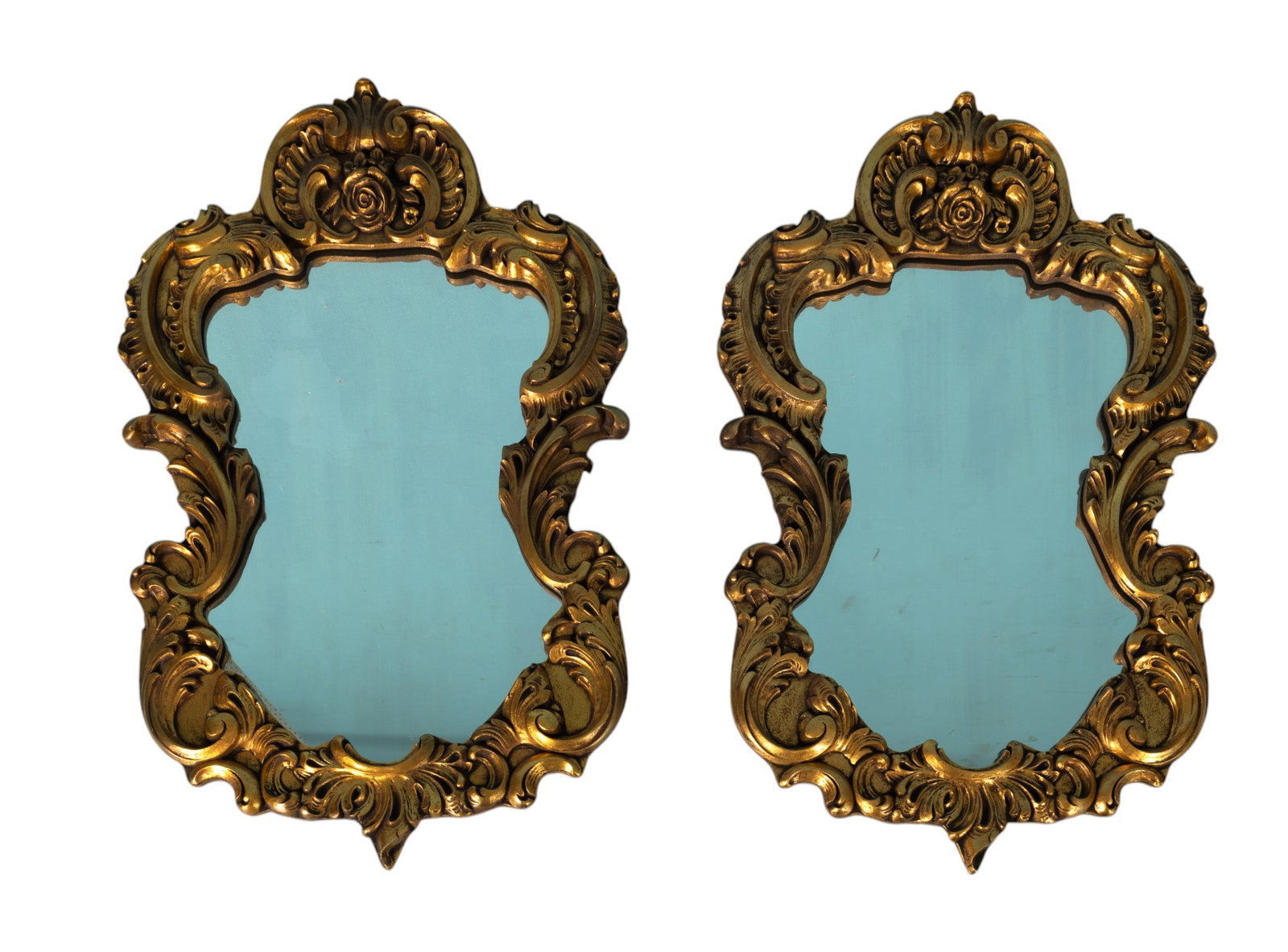 Pair of Gilt Wood Mirrors, 20th C .Decorative: Pair of gilt wood & gesso mirrors, Rococo style. Each measures approx. 25.5" tall, 16.25" wide, & 1.75" deep. Previously sold at Pook & Pook Auctions.