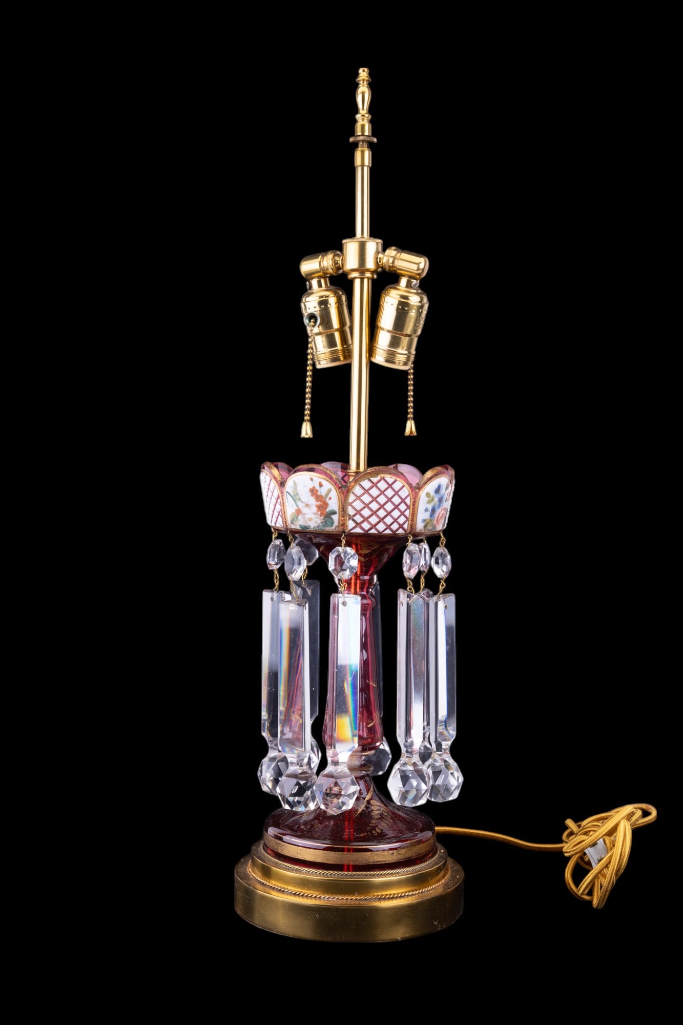 19th C Moser Bohemian Glass Lamp: Moser Bohemian enameled white to magenta cut glass lamp w/ gilded highlights. Lamp has heavy lusters, floral motifs, & could potentially use a new cord. Lamp is approx. 25" tall (no finial). Some loss