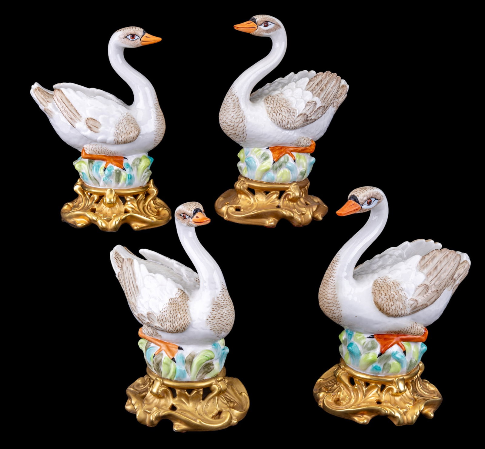 Mottahedeh Swan Sculptures (4): 4 Mottahedeh porcelain swan sculptures approx. 8" tall. Marked on bottom.
