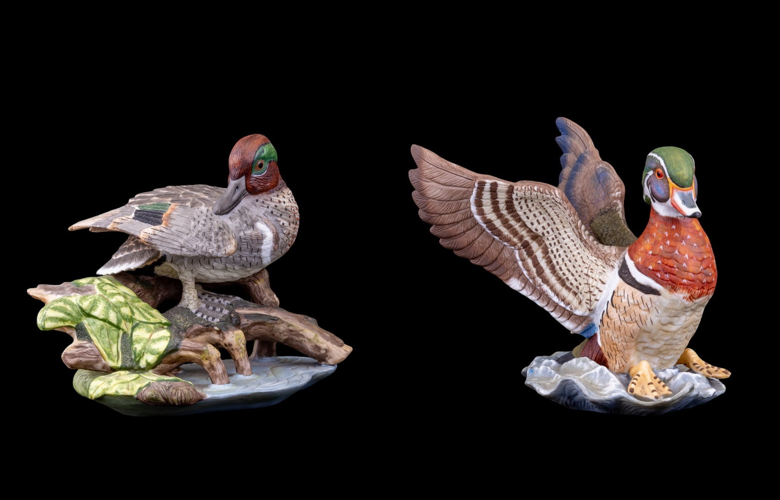 Carol Werner Burgues Duck Figurines: Carol Werner Burgues "Green-Winged Teal" duck & "Wood Duck" porcelain sculptures. "Green-Winged Teal" sculpture measures approx. 6.5" tall.
