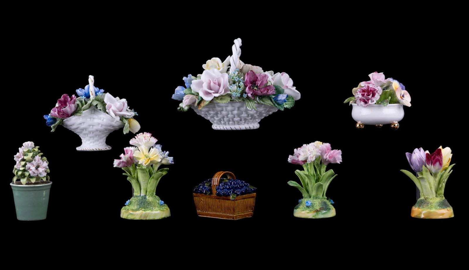 8 Fine Porcelain Flower Arrangements: Grouping of 8 porcelain flower arrangements w/ bright spring colors. Largest is an Italian-made & measures approx. 4.5" tall. 4 are Crown Staffordshire. The other 3 are unmarked.