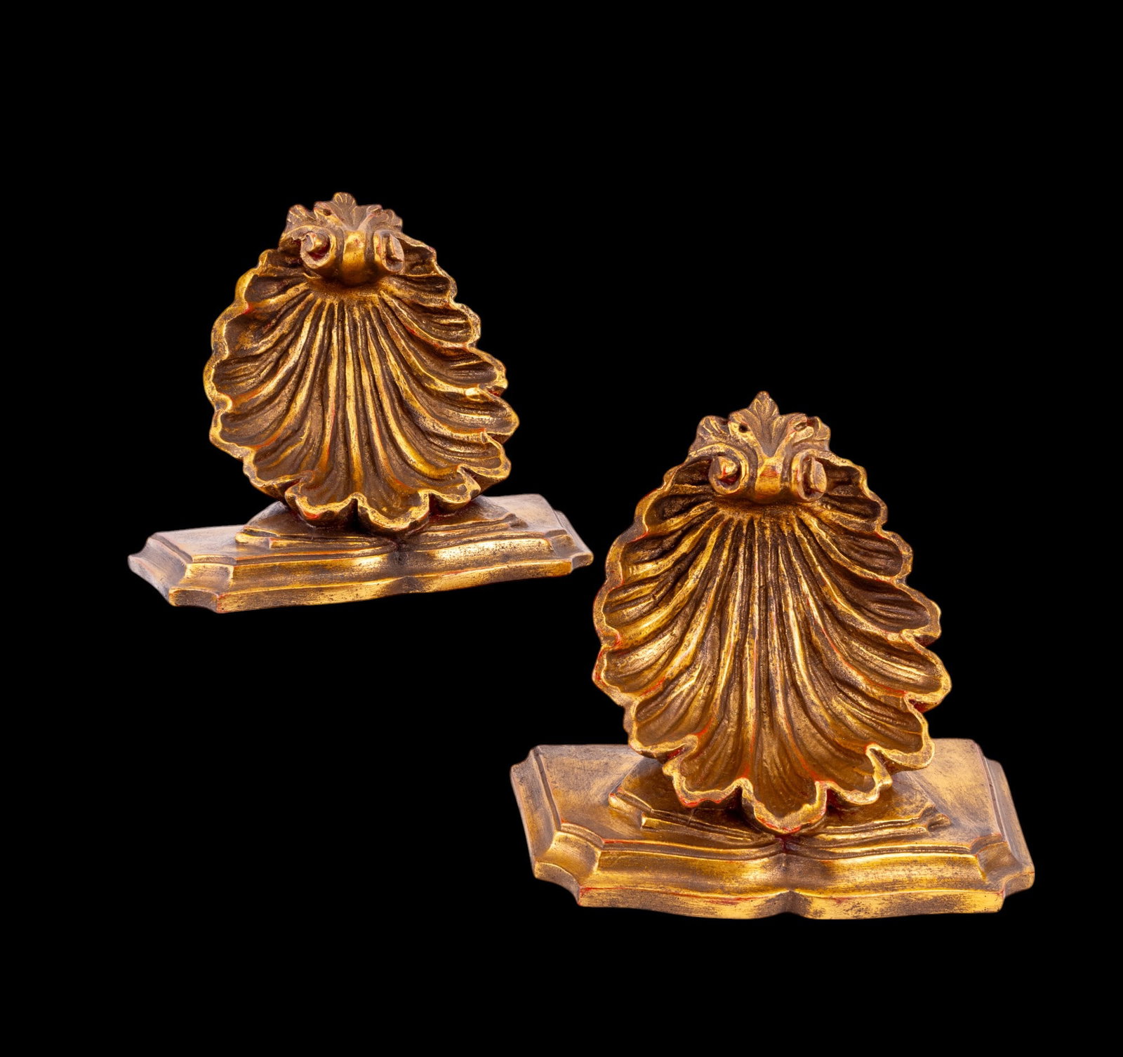 Pair of Pottery Shell Hanging Wall Shelves: Pair of pottery shell-shaped hanging wall shelves made by Art World, Fort Lauderdale, Florida. Items measure approx. 9" tall, 10" wide, & 5.5" deep. They appear unused.