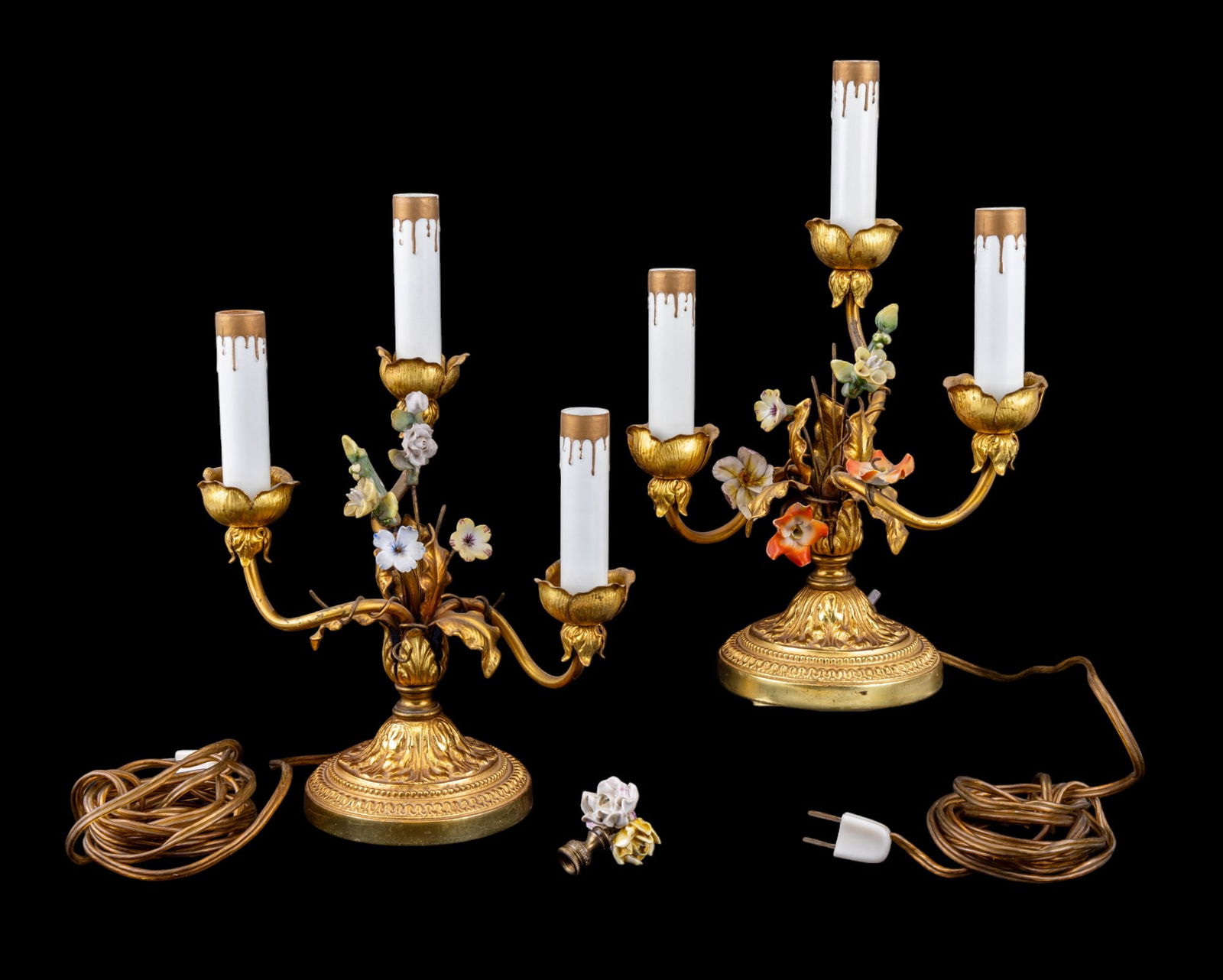 Lamp Pair - Antique Bronze & Enamel: Pair of first-half 20th C bronze & enamel / porcelain table lamps w/ floral and leaf motifs & faux candlesticks. Each is approx. 12" tall.