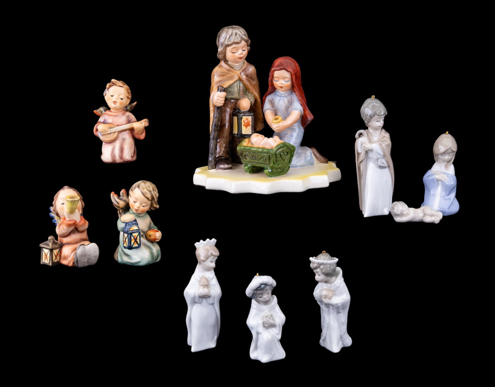Lladro & Goebel Christmas Figurines: Lladro & Goebel Christmas figurines, including Goebel Nativity scene & 3 angels & Lladro Joseph, Mary, Jesus, & 3 Kings. Goebel Nativity scene measures approx. 5.5" tall.