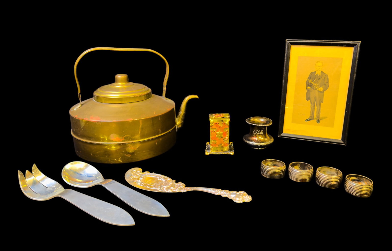 Brass Kettle, Pewter Utensils, and Silverplate: Meriden silver plate jar/vase 3", four silver plate napkin rings, small brass hand made coin bank, plaque reads 'JFCS 1999', ornate cake knife signed, signature illegible, pewter serving spoon and for