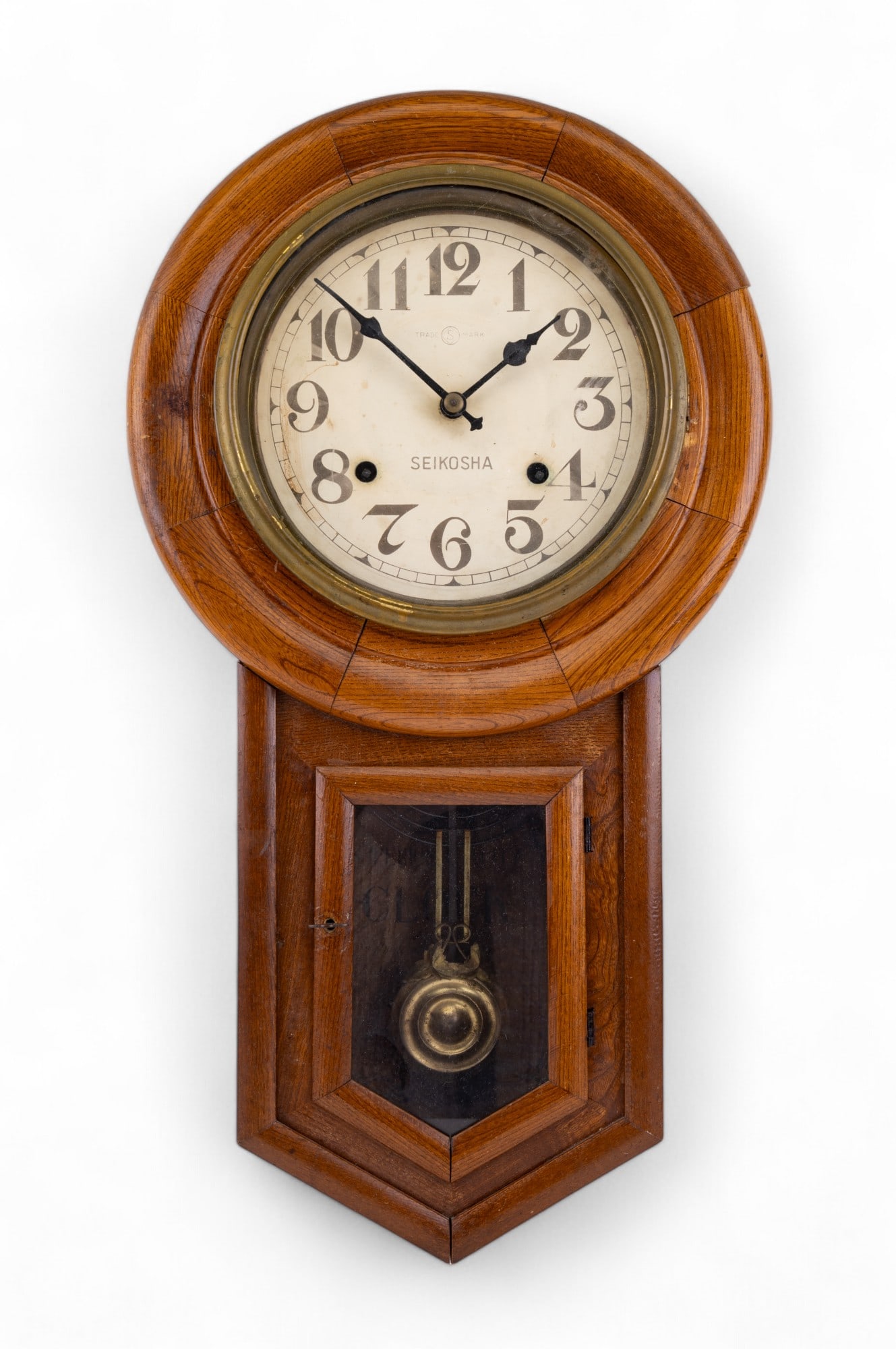 Vintage Seikosha Wall Clock: Seikosha vintage wall case / mechanical / regulator clock measuring approx. 22.5" tall with round top and face having a diameter of approx. 8". Case comes to a point at the bottom. Untested.