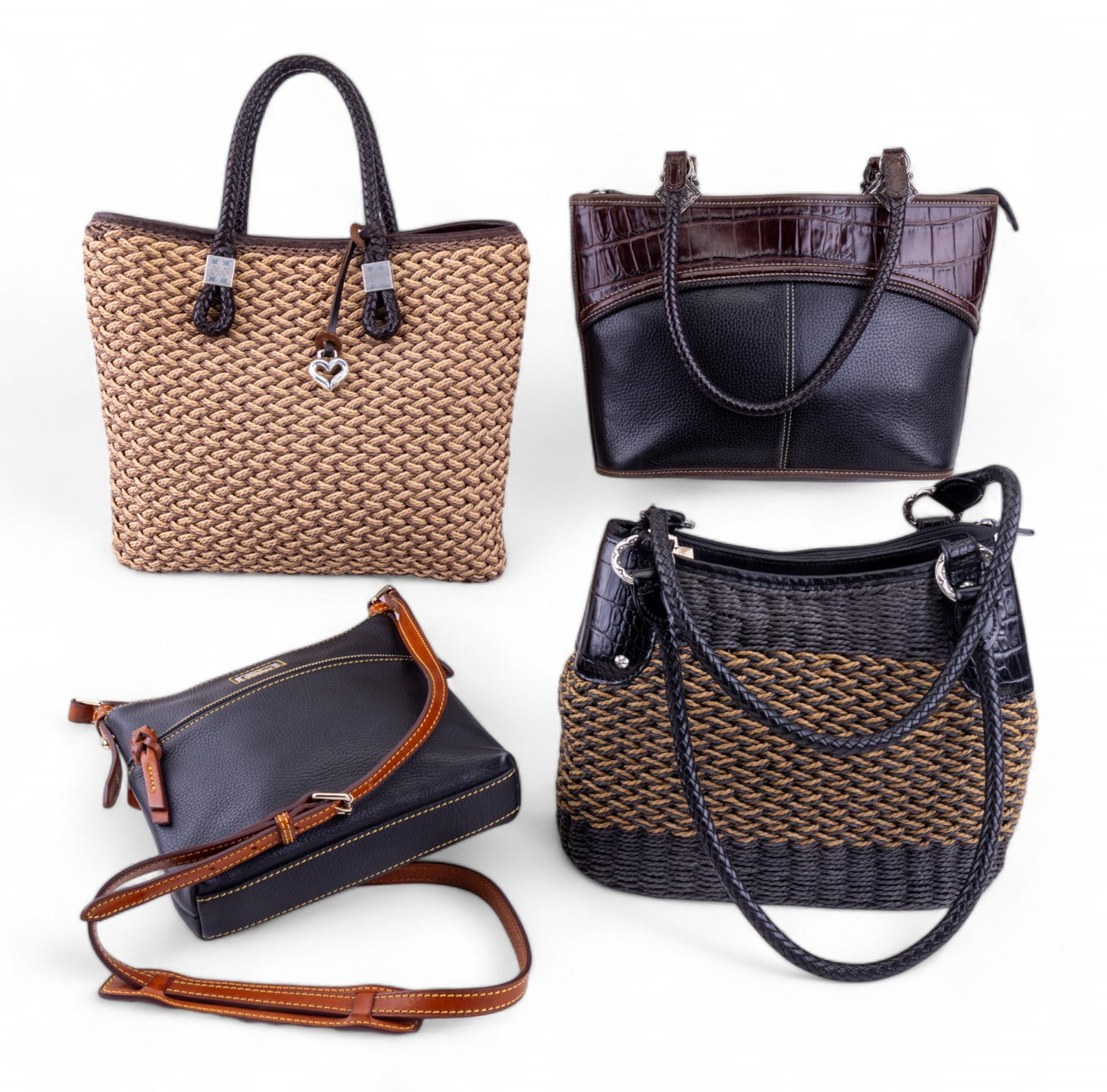 Dooney & Bourke and Brighton Handbags: Black leather Dooney & Bourke cross-body bag with brown leather strap, Brighton black and brown leather bag #549348, and two Brighton woven jute and stamped leather hand bags.