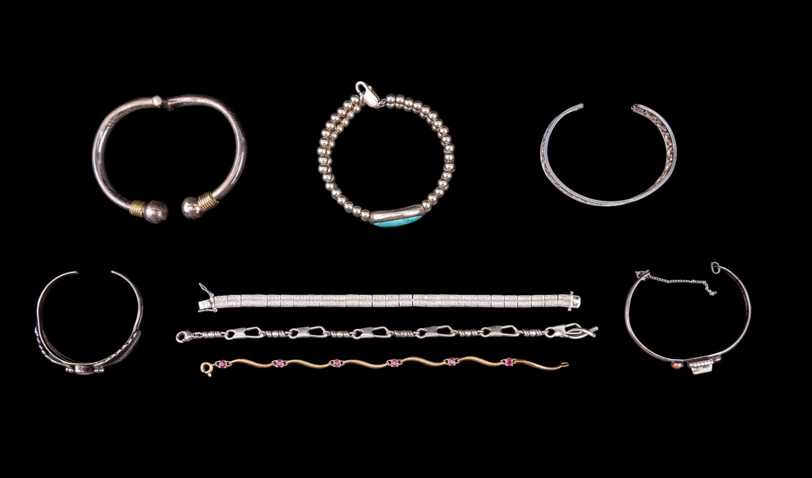 ATI Mexico, Native, & More Sterling Bracelets (8): 8 total sterling silver bracelets, including an ATI Mexican 2-strand sterling bead & turquoise cabochon bracelet, AL Native American cuff bracelet w/ pink mother-of-pearl accent, a scrimshaw sailboat 