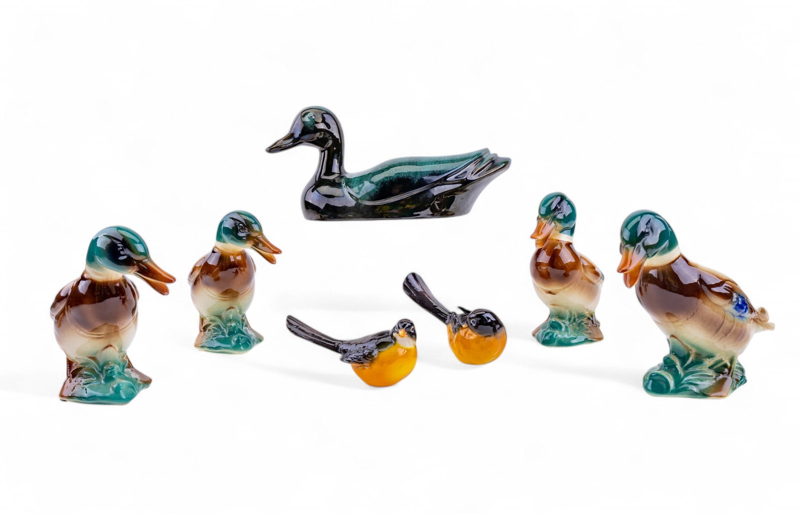 Ceramic and Porcelain Bird Figurines: Enesco Seagull Porcelain Collection 2 piece porcelain robin figurine set #287415, 4x3", four Hull USA vintage ceramic mallard drake statues 6", and a flame fired red clay ceramic figurine by Blue Moun