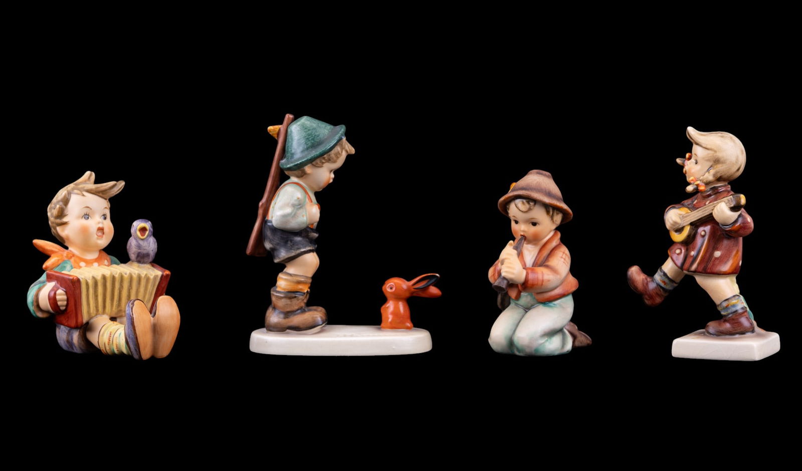M. I. Hummel Figurines: Sensative Hunter #6/0 5", Let's Sing #110/1 4", Little Tooter #214H 4", and Happiness #86 5". No chips or cracks.