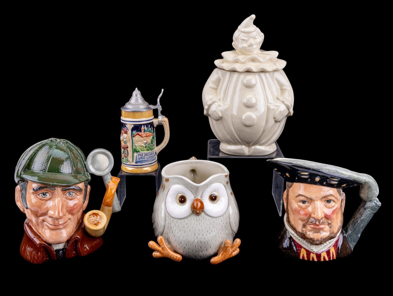 Royal Doulton, Fitz & Floyd, Pan American Ceramics: Royal Doulton figural pitcher depicting Henry VIII #D6642, 7", Royal Doulton figural pitcher depicting Sherlock Holmes titled 'The Sleuth' #D6631, 8", vintage Pan American ceramic clown cookie jar 11"