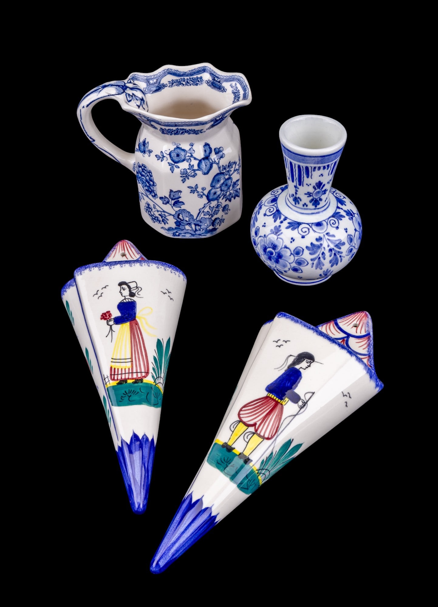 Delft, Masons Ironstone, and Quimper Vessels: Small hand painted Delft bud vase 5", Mason's Ironstone 'Manchu' pattern creamer jug 4.5", and two hand painted V-shaped wall hanging sconce vases depicting a man and woman Henriot Quimper F776 D201, 