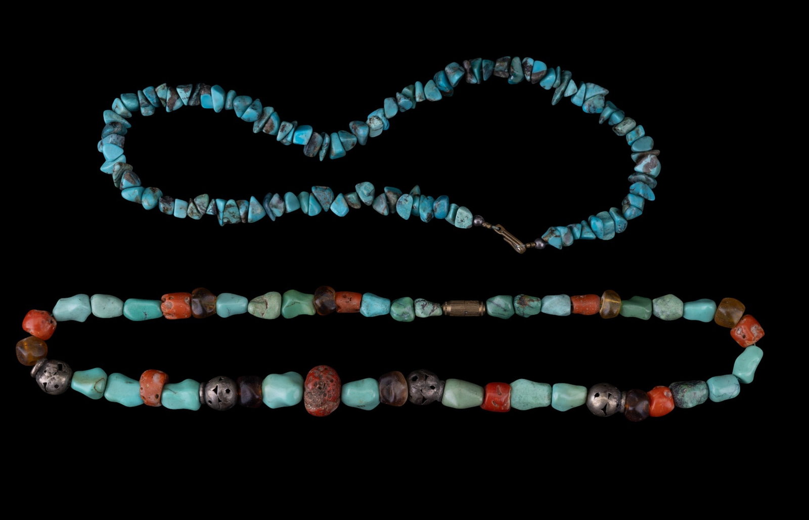 Native American Turquoise Necklaces (2): Two vintage Native American chunk and turquoise and coral nugget style necklaces.