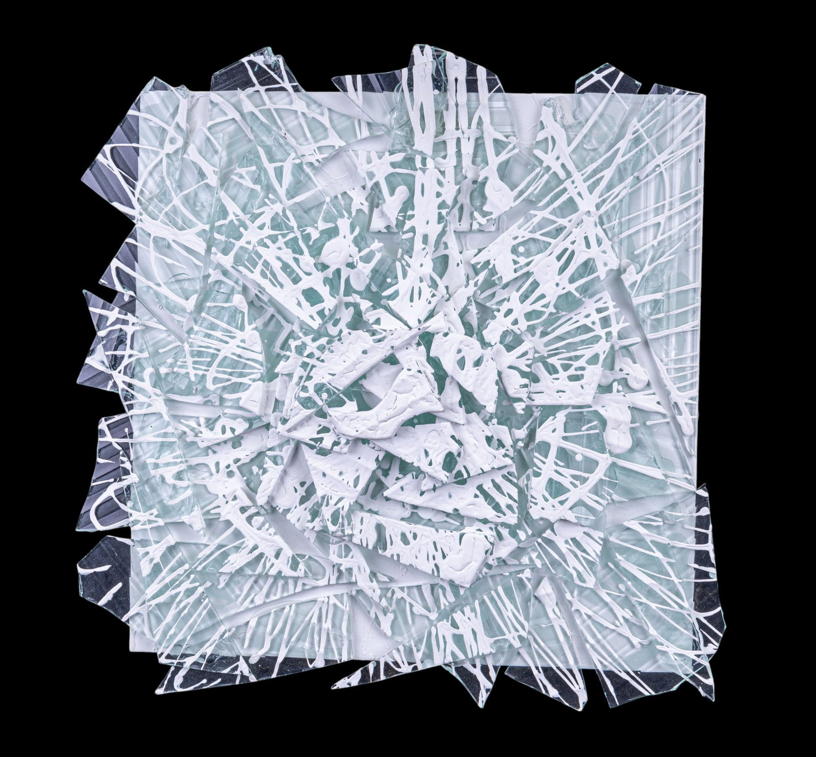 Jane Braddock "Lila" Mixed Media Wall Sculpture: Jane Braddock "Lila" mixed media wall sculpture consisting of pieces of broken glass and while paint mounted on a panel - art measures approx. 13" x 13" and includes cleat for hanging. Includes artist