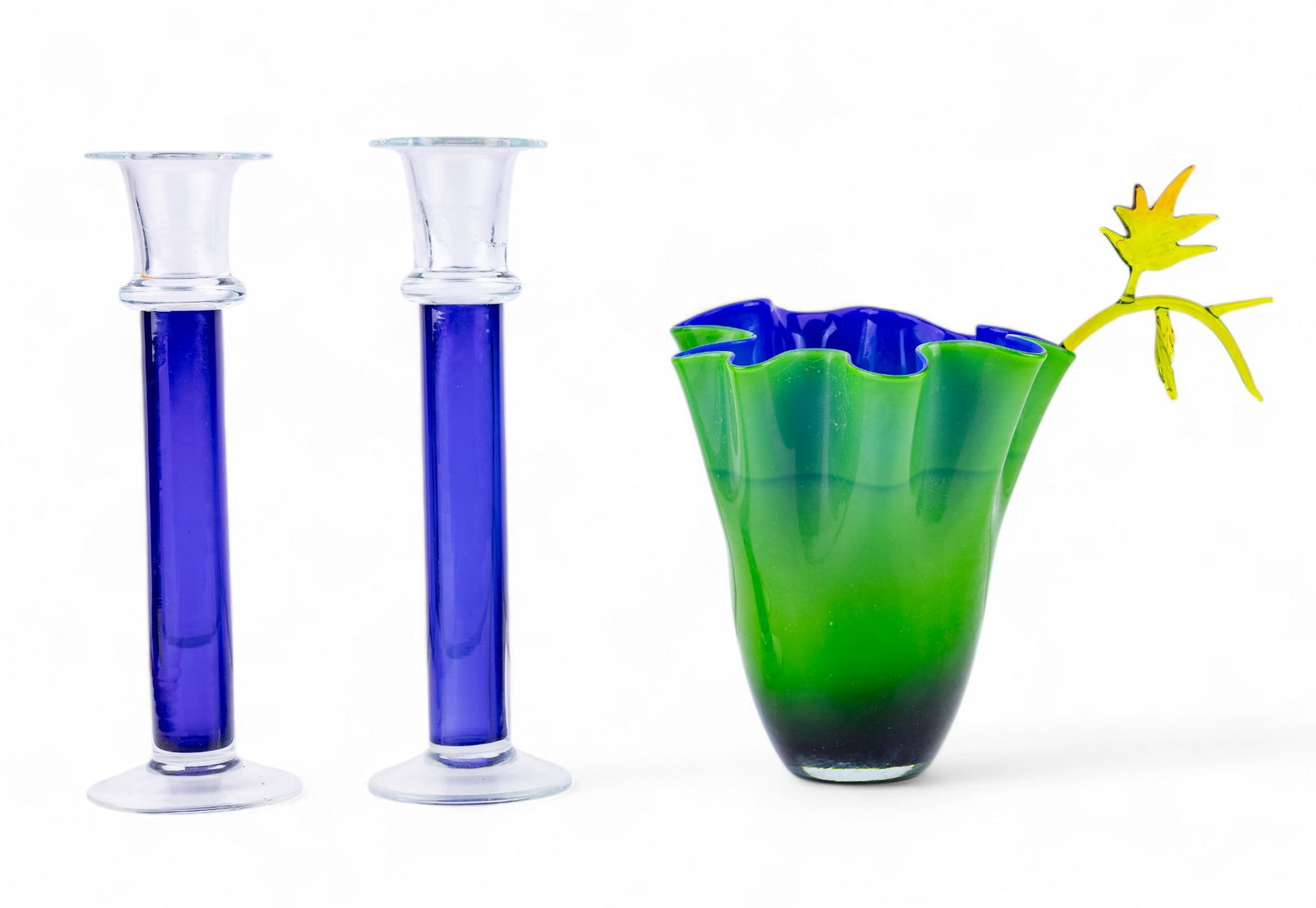 "Gorgeous Designs" Vase and Glass Candlesticks: Green with cobalt blue glass interior handkerchief vase by Gorgeous Designs 7", stickered on bottom, two royal blue and clear glass candlesticks 10", and a delicate blown glass leaf and stem 10.5x4.5"