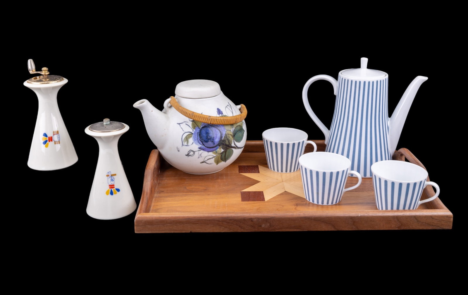 Teapots, S&P, by Lenox, Arabia Finland, Melitta: Lot includes a mid-century Lenox pepper mill and salt shaker, both in ceramic with colorful hand motifs, standing approximately 7 inches tall. Also features an Arabia Finland teapot with a floral desi