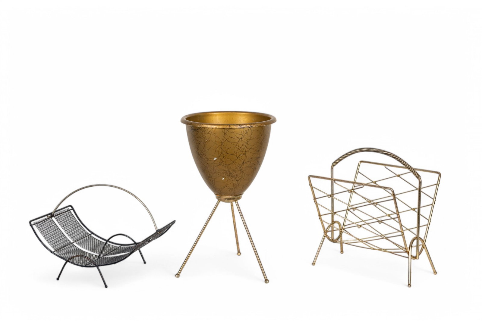 Mid-Century Brass Newspaper Rack and Containers: Lot includes a gold-painted mid-century composite plastic planter measuring 13x23 inches, a fireplace log rest with dimensions of 17.5x12x13 inches, and a brass newspaper rack measuring 14x14x18 inche