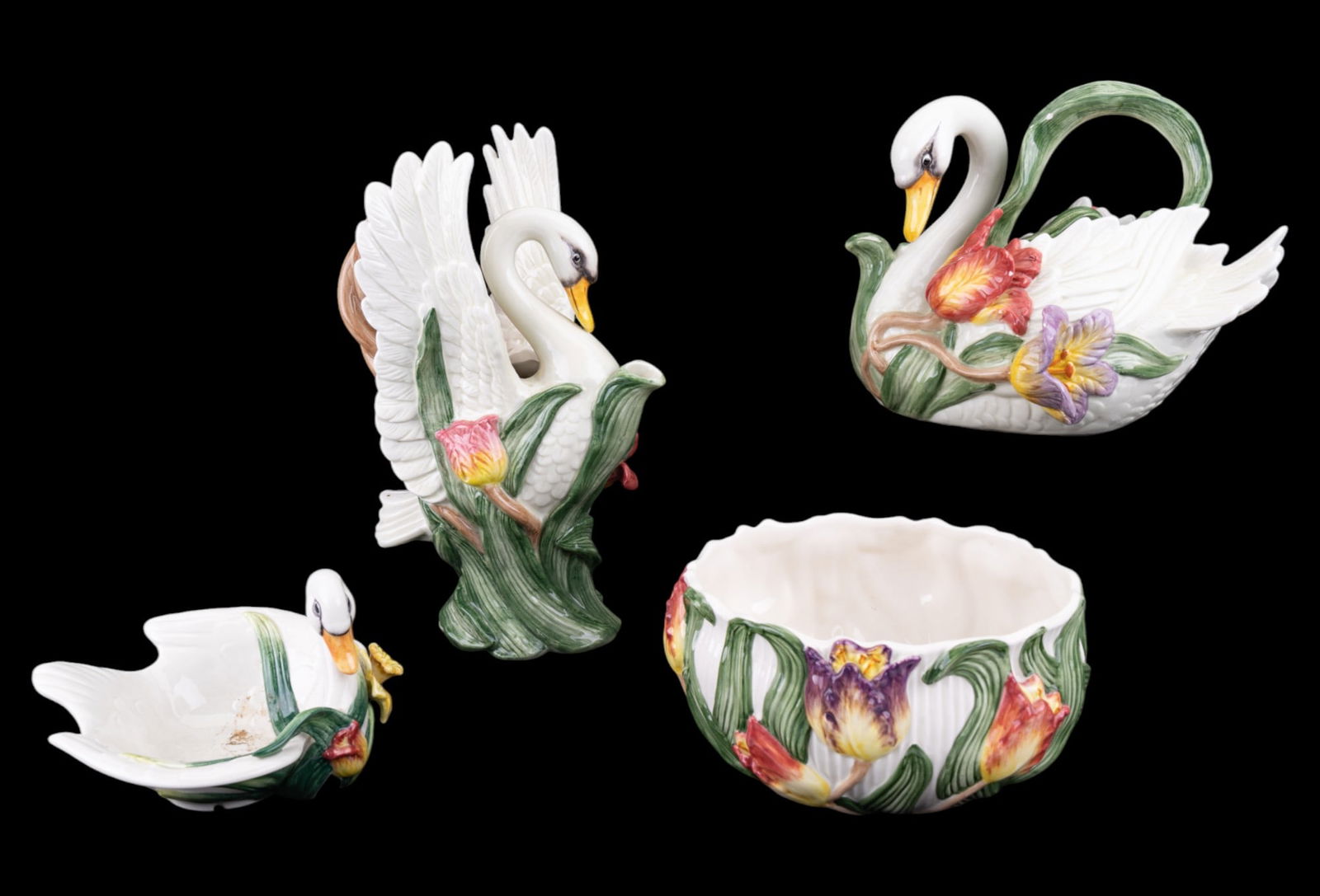 Fitz and Floyd Swan Ceramic Serveware Set: Set of Fitz and Floyd ceramic serveware featuring swan and floral designs. Includes a swan pitcher, a swan tea pot, a matching swan bowl, and a small dish. Each piece is hand-painted with intricate de