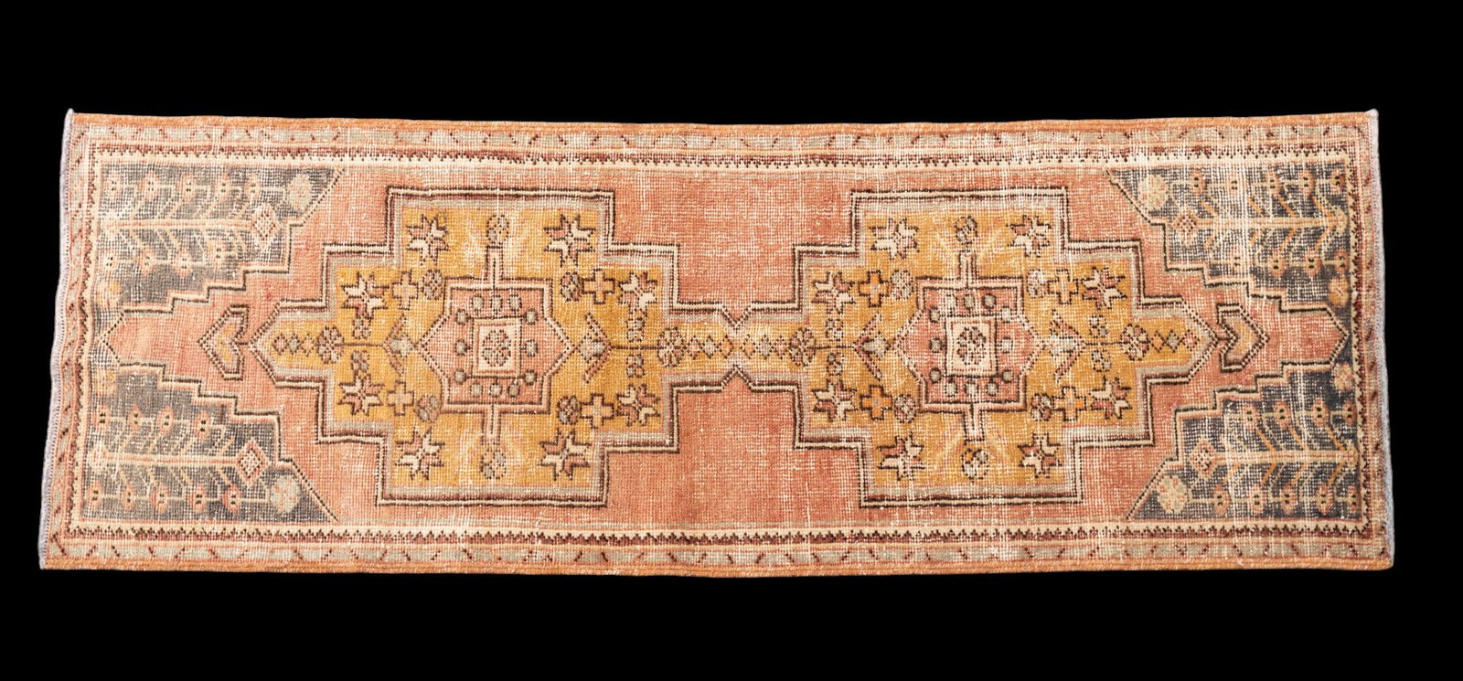 Antique Oushak Rug: Antique Oushak rug approx. 2'9" x 7'8" w/ dull red, burnt orange, tan, & brown patterns w/ geometric & floral motifs. *All rugs / carpets are used & come from fine estates. Keystone Auctions does not
