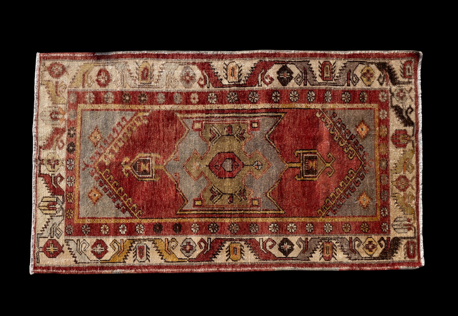 Turkish Oushak Rug: Turkish Oushak rug approx. 3'4" x 5'5" w/ red, gold, brown, tan, & ivory patterns w/ geometric & floral motifs. *All rugs / carpets are used & come from fine estates. Keystone Auctions does not clean 