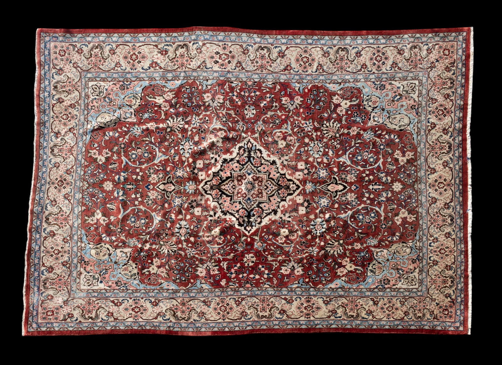Persian Sarouk Rug: Persian Sarouk rug approx. 10'4" x 14'1" w/ red, navy blue, livid bluish-gray, blue-green, green-gray, dull pink, brown, tan, & ivory patterns w/ floral motifs. *All rugs / carpets are used & come fro