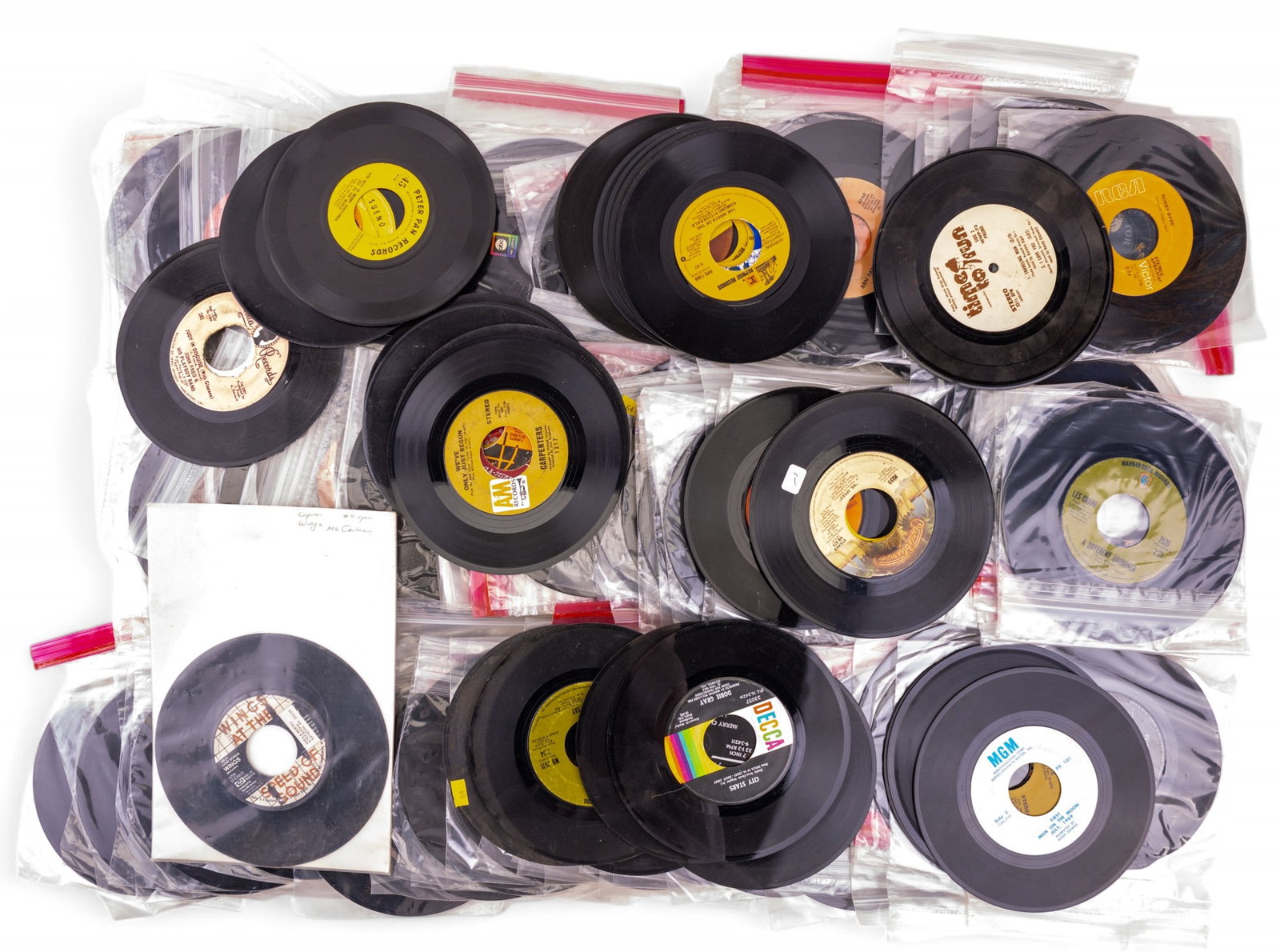 7-Inch Vinyl Records in 45 & 33 1/3 RPM (100+): Collection of between approx. 100 & 150 total 7-inch vinyl records of either 45 RPM or 33 1/3 RPM. Vinyl records feature a variety of artists & styles. Some artists include Motown by Michael Jackson, 