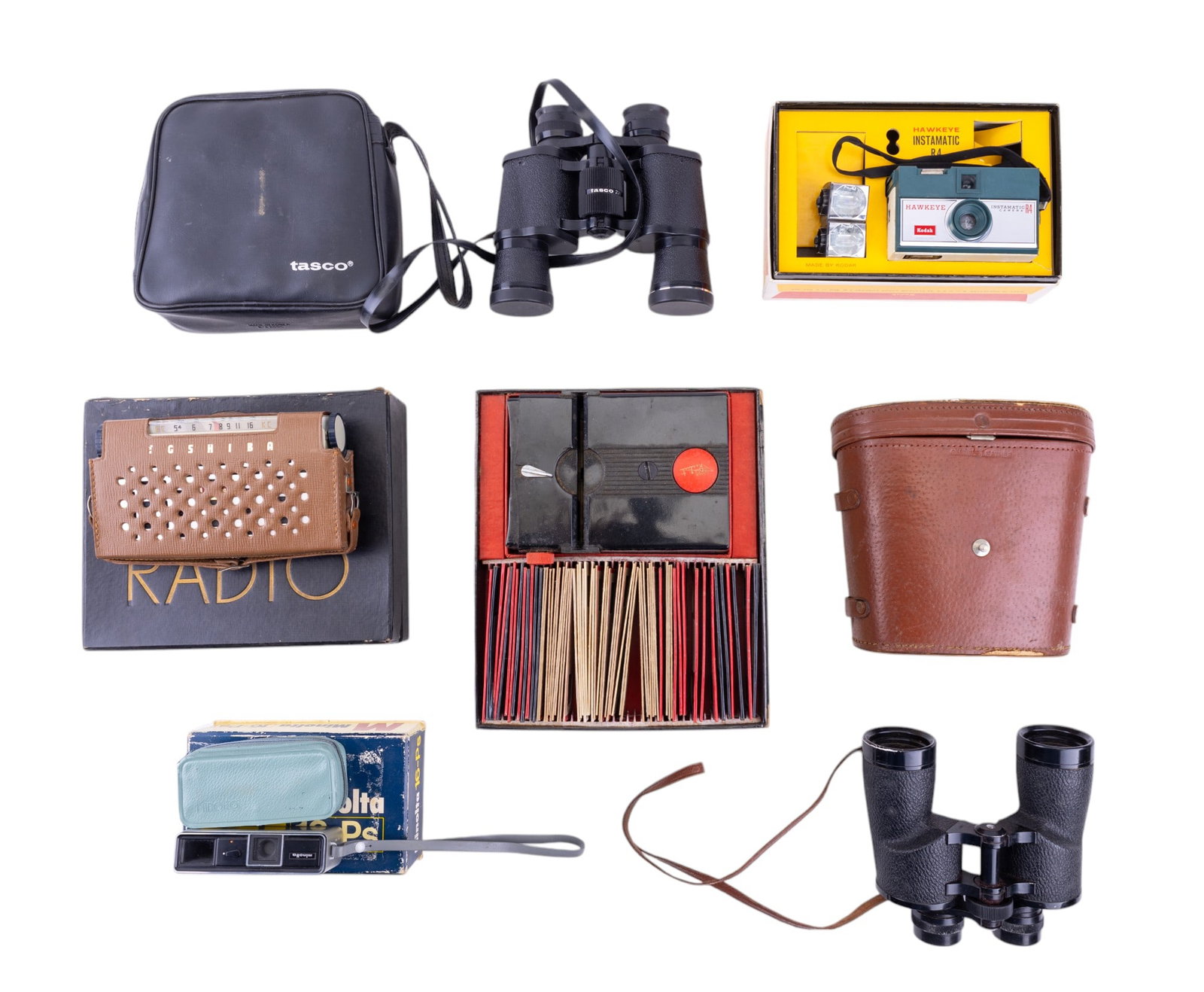 Vintage Kodak & Minolta Cameras, Binoculars & More: Vintage Kodak Hawkeye Instamatic R4 Camera in original box w/ instruction booklet & Flashcubes, Minolta 16-Ps camera in original box w/ green sand-colored leather case & instruction booklet, Stereo Re