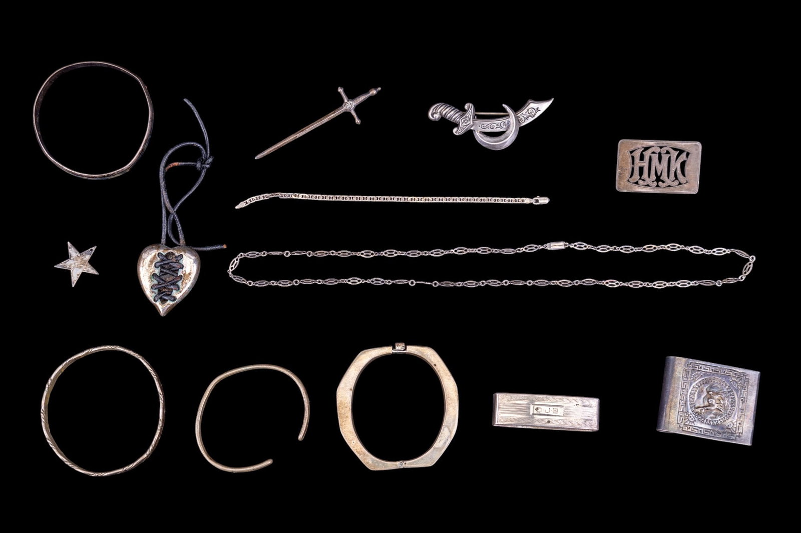 Sterling Jewelry Collection (13): Collection features 3 hand wrought bracelets with M.O.P. inlay and hand etched designs, 2 sword pins, 1 geometric hinge bracelet marked "Mexico 925 - TS-75", 2 belt buckles with an alpaca motif and mo
