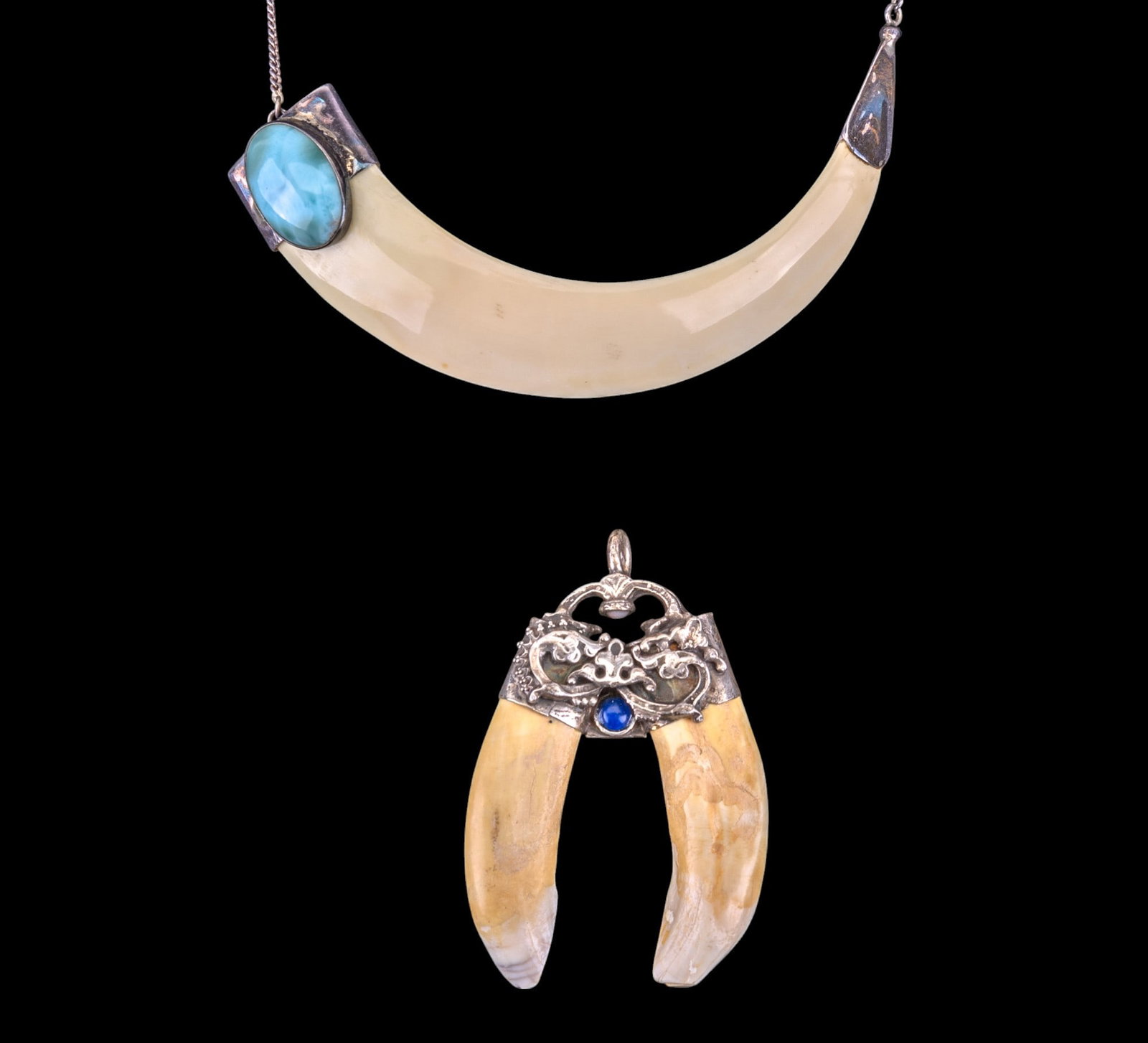 Animal Tooth Jewelry with Sterling: Large tooth necklace with sterling chain and blue stone accent and an ornate unmarked silver pendant with 2 teeth.