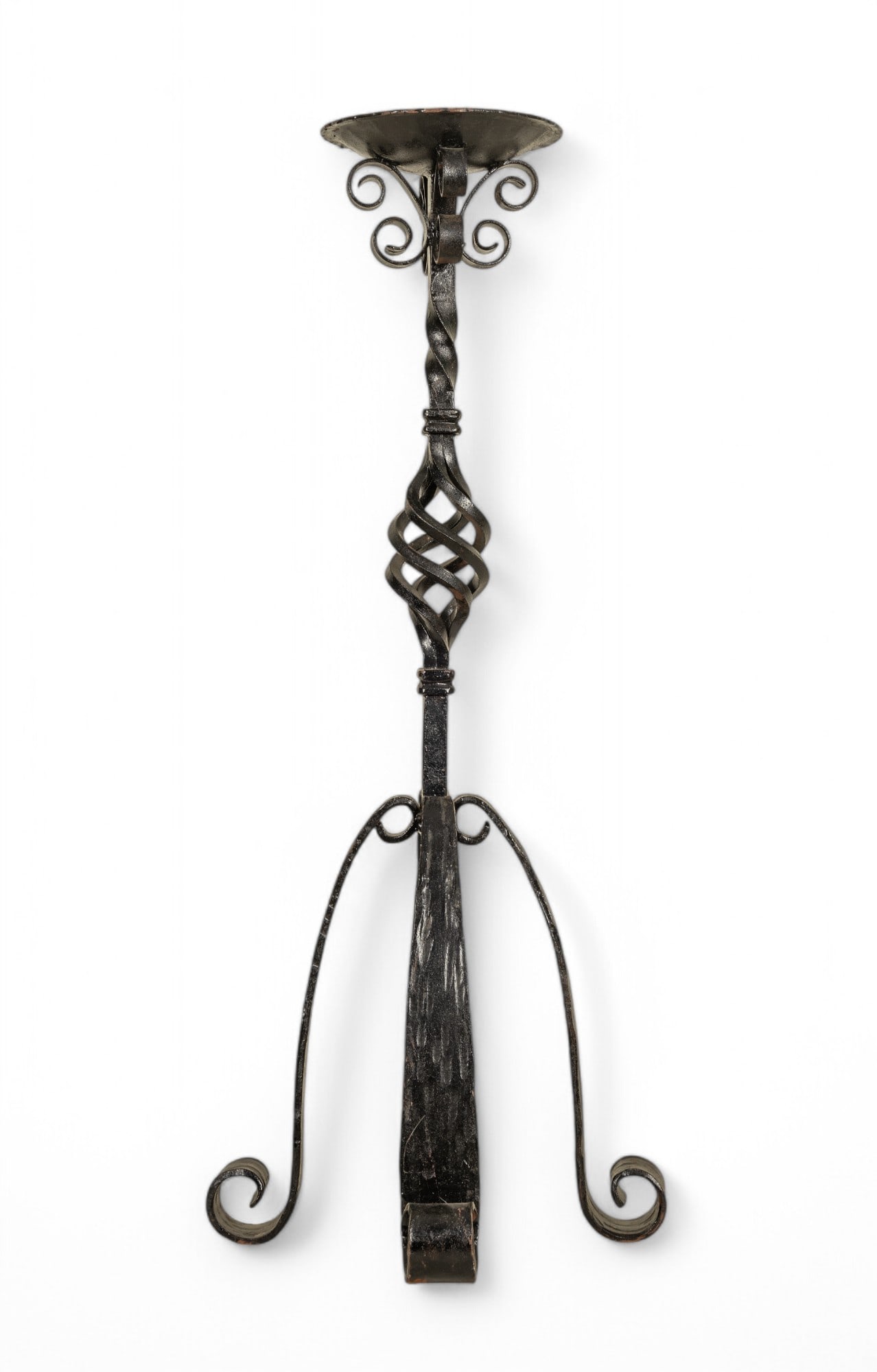 Iron Candle Holder: Heavy wrought iron floor standing pillar candle holder with twisting design in the center, note some paint chipping, 15x15x36". Special arrangements will need to be made for pick up or shipping of thi