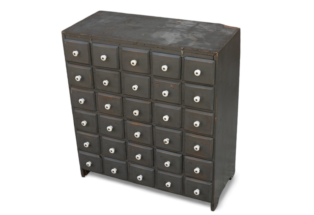Apothecary Style Cabinet w/ Porcelain Knobs: Apothecary style cabinet with painted drawers and porcelain knobs. 25.5" high, 23" across, 10.5" deep approximately.