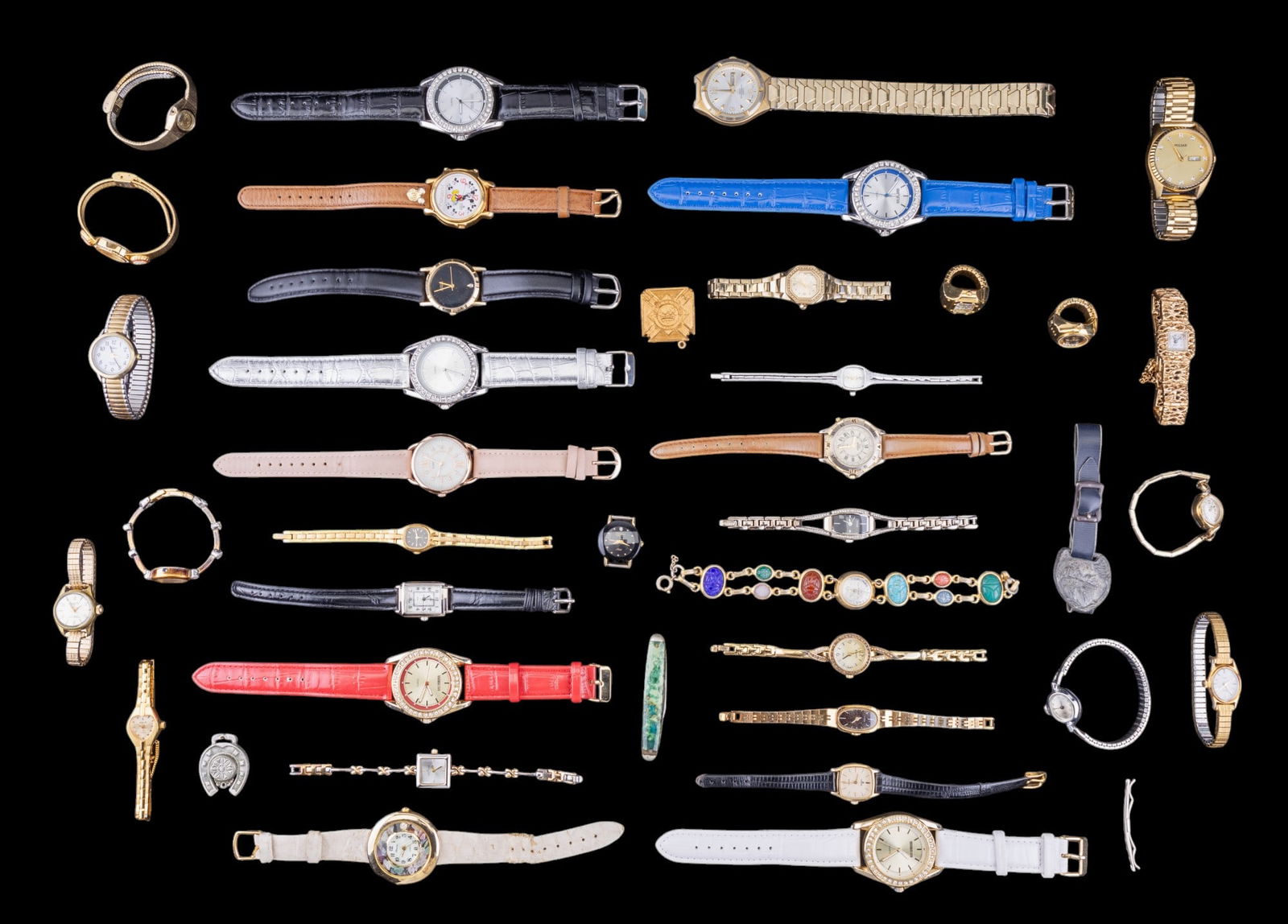 Vintage and Modern Wrist Watches: Five Manhattan brand wrist watches with leather bands and rhinestone framed faces, vintage wrist watches from Pulsar, Beacon Hill, Waltham, Timex, Benrus, Lady Nelson, a Lorus Mickey Mouse watch, and