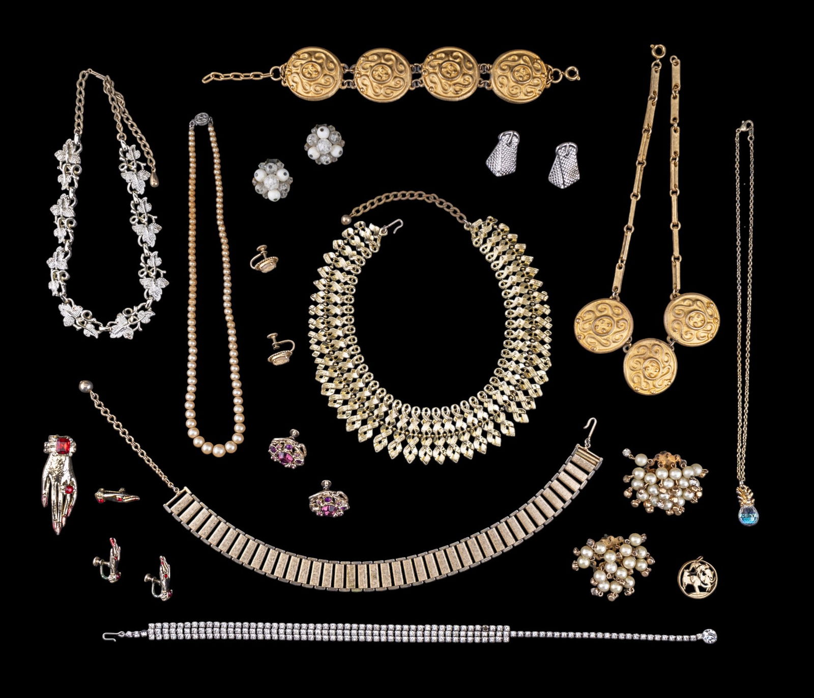 Coro and Vintage Estate Jewelry: Coro cameo screw back earrings, faux pearl clip on earrings, gold and silver tone clip on and screw back earrings and necklaces, including Sara Coventry leaf motif necklace, unique red rhinestone and