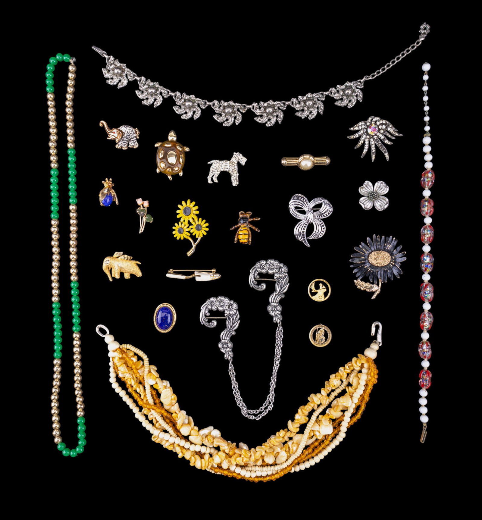 Estate Jewelry: Vintage estate jewelry including a six strand shell necklace, gold tone, silver tone, rhinestone, and enamel brooches by Marvella, Napier, Robert, and other whimsical designs.