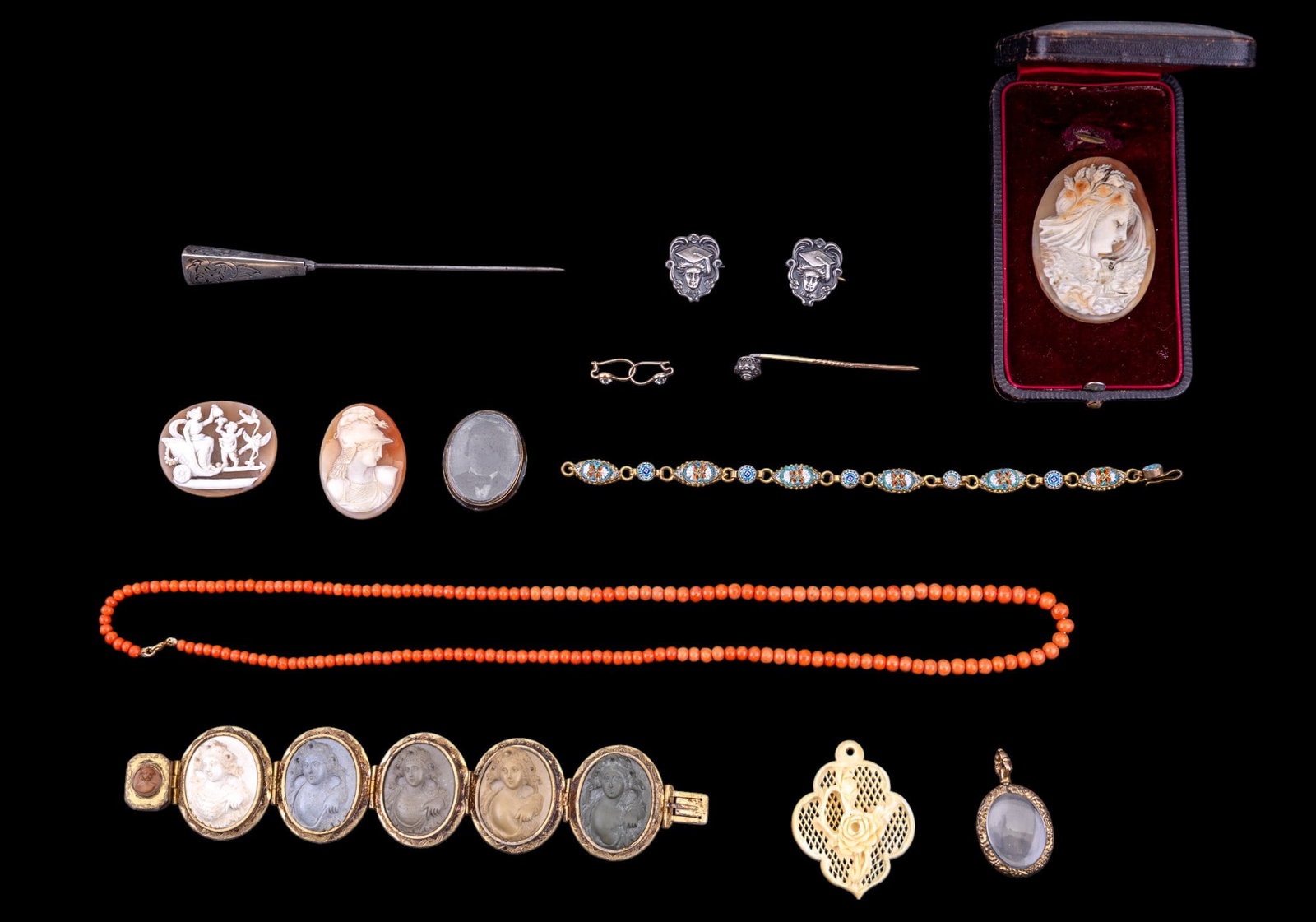 Lava Cameo and Victorian Jewelry: Fine early carved 'Lava Cameo' relief panel bracelet, graduated coral necklace 26", Victorian topped etched sterling hat pin, Victorian hair locket with tin-type inside, Victorian magnifier pendant, m