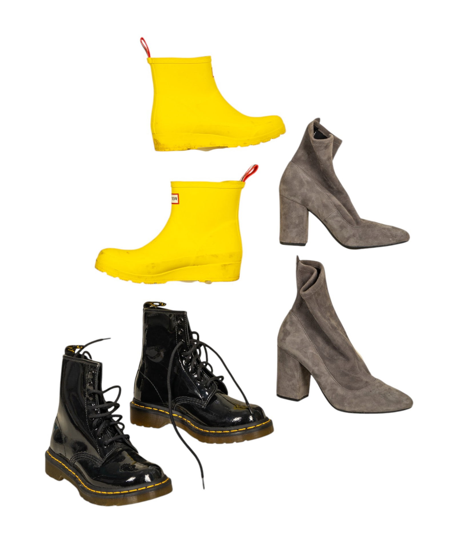 Designer Boots (3) in Assorted Styles and Sizes: Lot includes a pair of Coach gray suede boots, size 36.5, featuring a stylish, understated design. Additionally, a pair of Dr. Martens black patent leather lace-up boots in like new condition size 36.